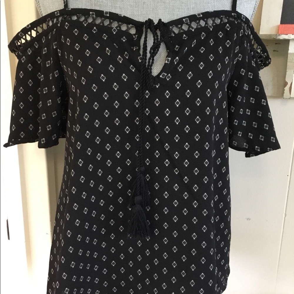 Black & white spaghetti strap blouse.